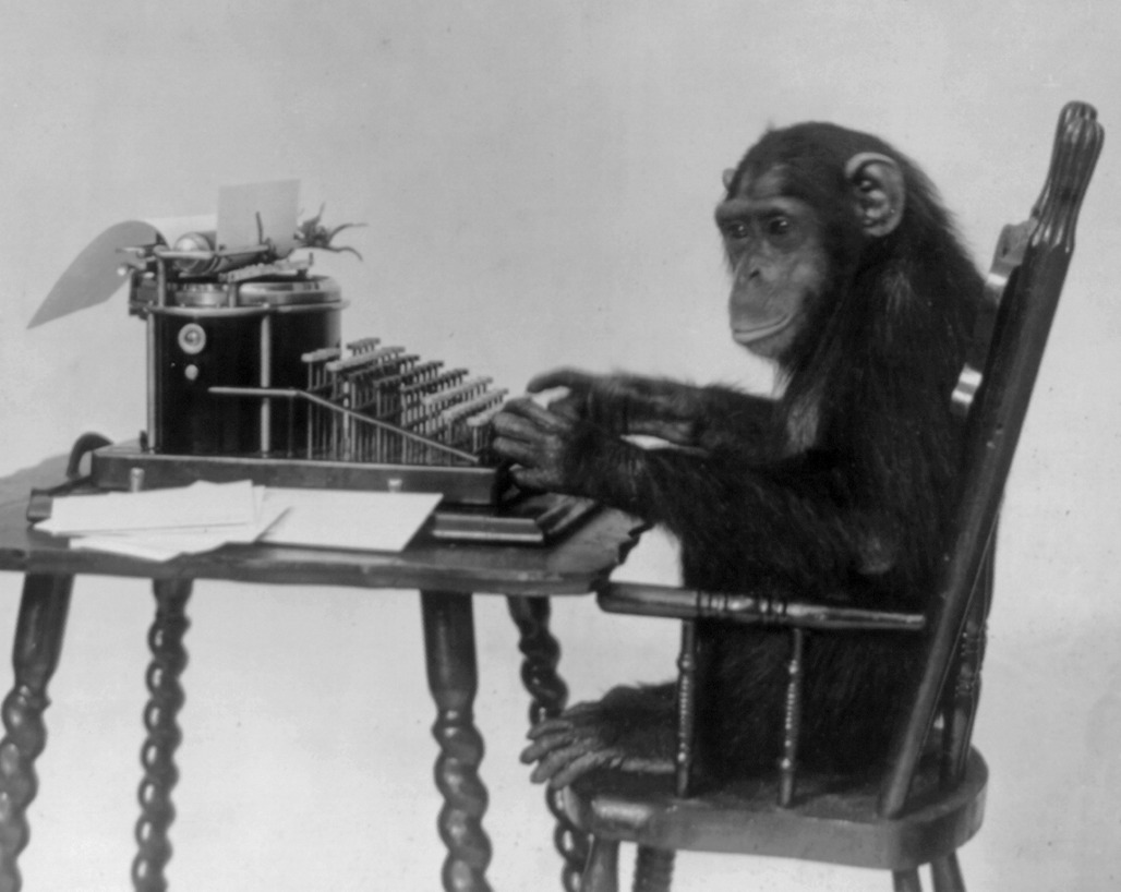 Monkey typing on a typewriter